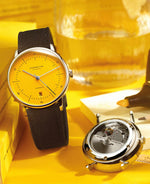 popup|Glass back with engraved consecutive numbering|The numbering on the back of the case gives each piece an individual touch. The certificate of authenticity additionally confirms the uniqueness of each Edition Yellow.