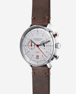 popup|Form follows function|The design of the chronograph follows the Bauhaus principle of "form follows function": the pusher at 2 o'clock has the same signal colour as the large chrono hand and the left-hand totaliser (stop minute) to emphasise the connection.