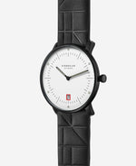 popup|Framed date in red|This small detail is a tribute to the red door of the Bauhaus building in Dessau.