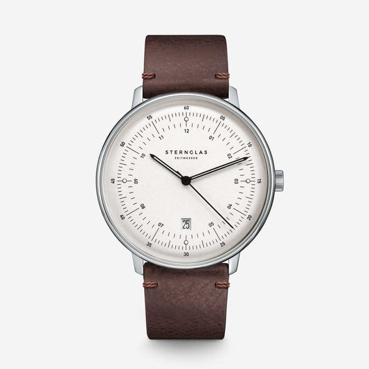 popup|Curved dial|The silvery satin-finished dial with fine curvature gives the model a noble vintage character.
