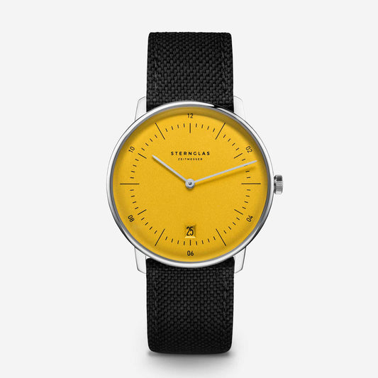 popup|Classical Bauhaus design|Inspired by the Bauhaus movement of the 1920s, the dial is reduced and clear. "Form follows function.