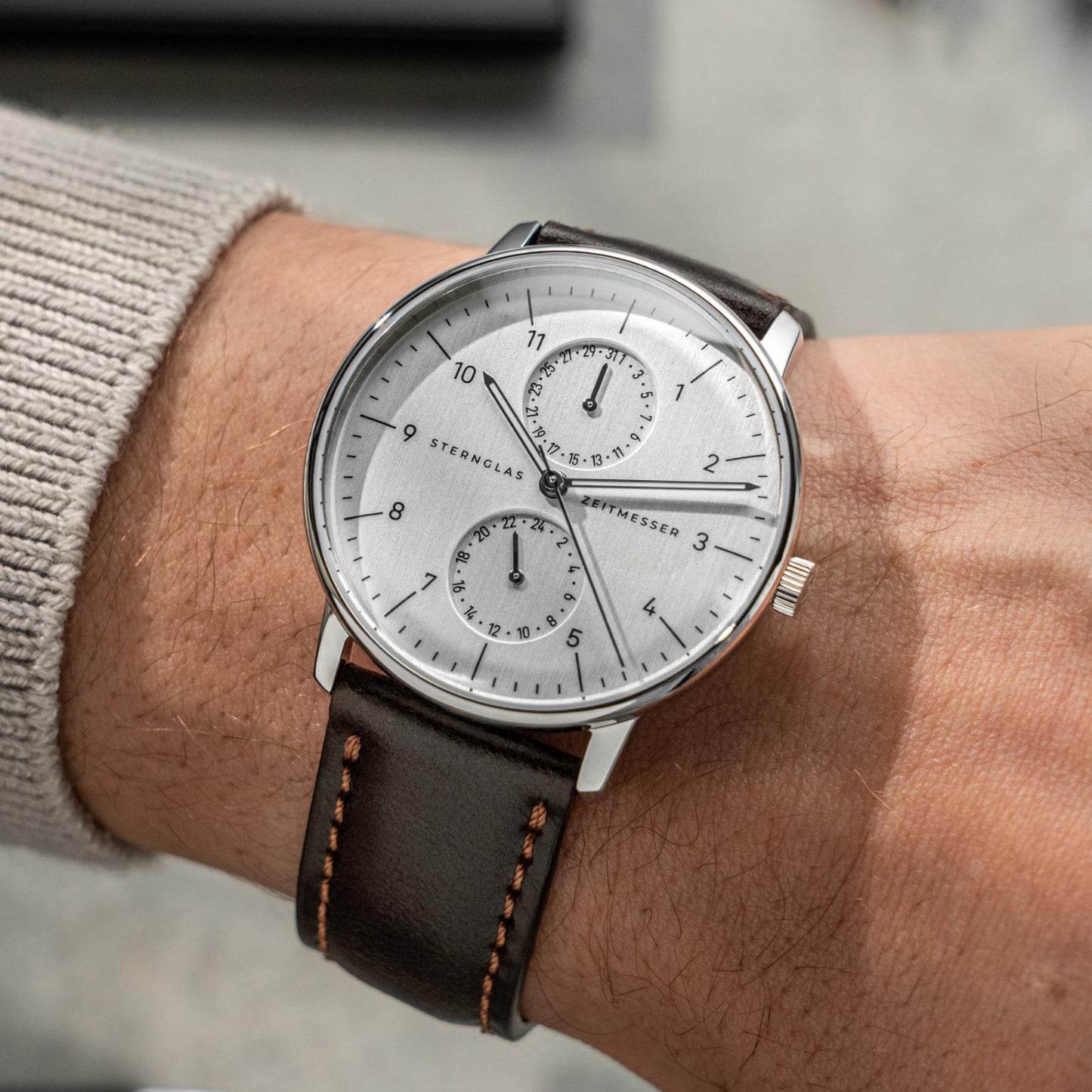 Sternglas Zirkel X silver worn on a wrist