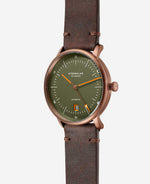 popup|Domed dial|The reed green satin-finished dial with fine curvature gives the model an elegant vintage character.