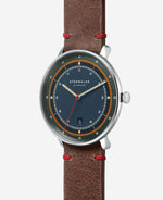 popup|Curved dial|The high-contrast satin-finish dial with fine curvature gives the model a colourful character.