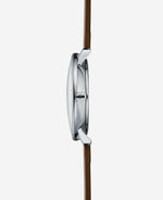 popup|Fits under every shirt sleeve|The particularly flat case construction makes the Naos Quartz the perfect dress watch for everyday wear.